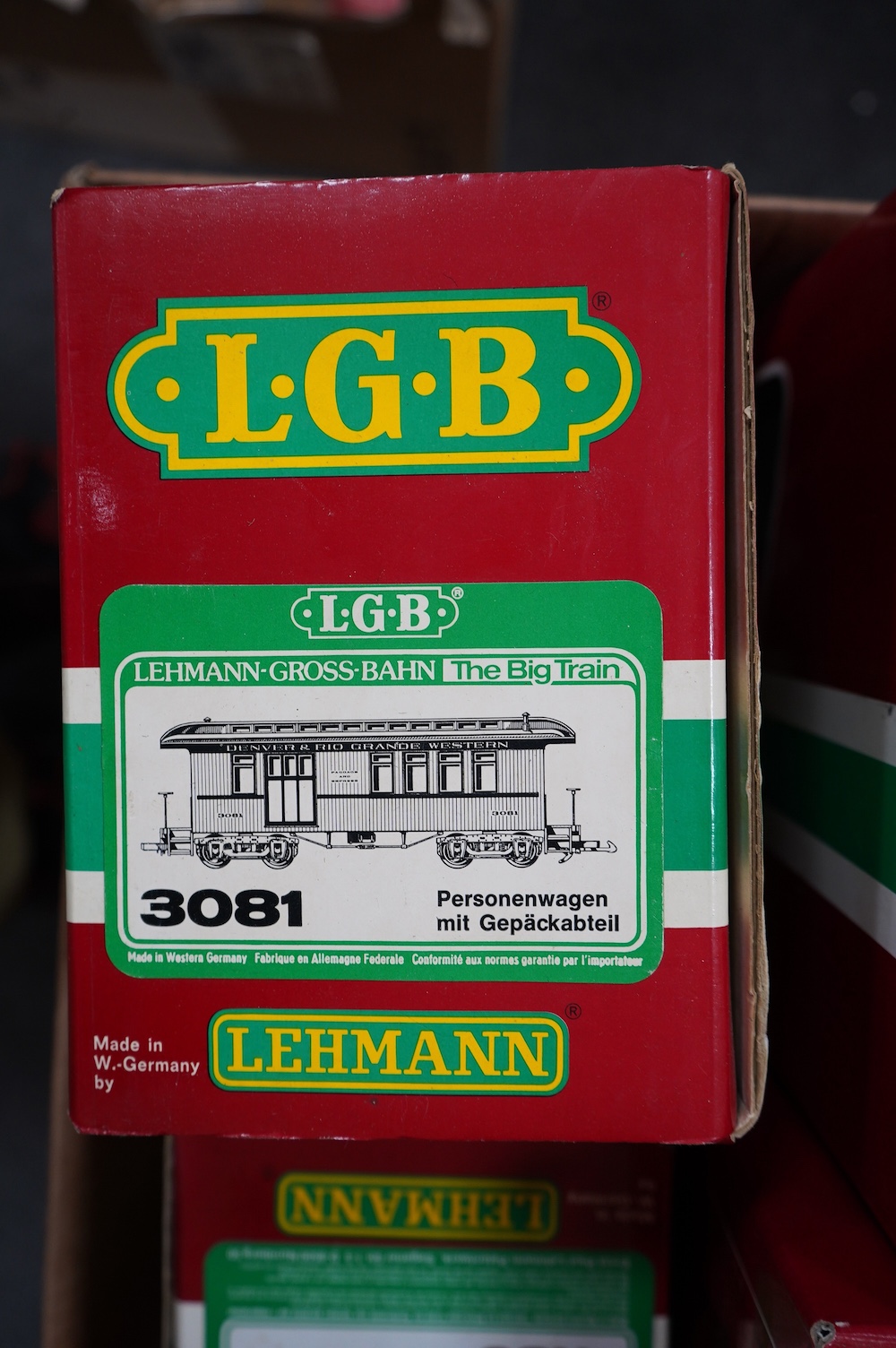 Four boxed Lehmann LGB G scale bogie rolling stock; a tanker (4080-Y 05), a car transporter (4159), And two Denver and Rio Grande Western Railway coaches (3081 and 4075). Condition - good.